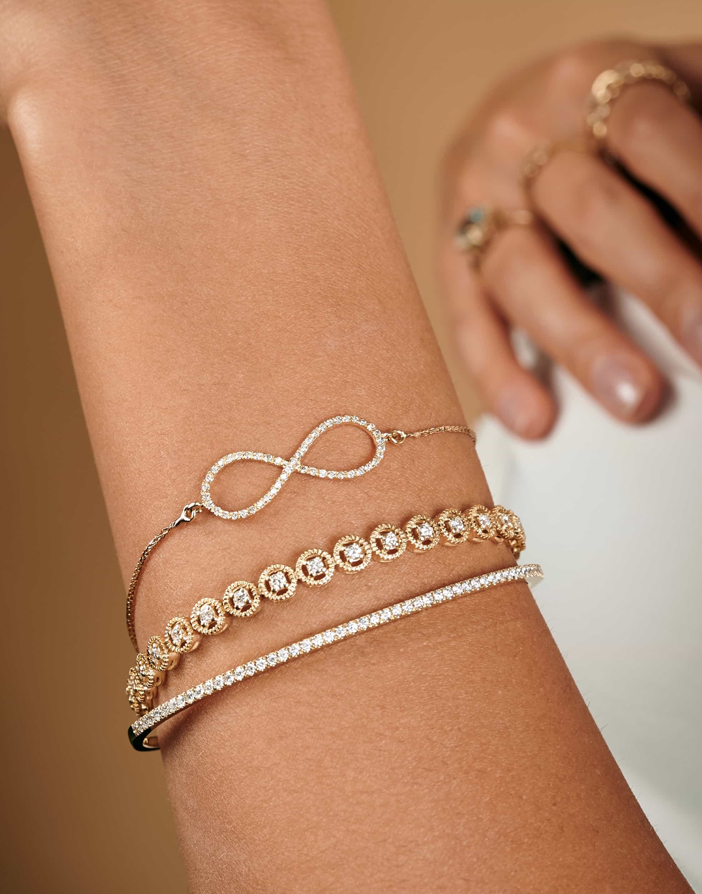 Gold infinity bracelet store with diamonds